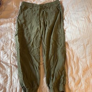 Green Army pants with pocket detailing